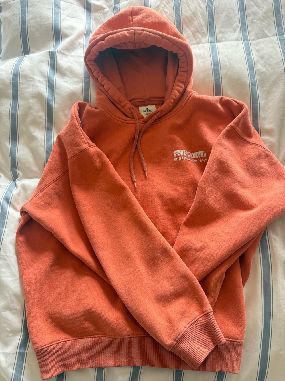 Rip Curl Women’s Coral Orange Hoodie with White Logo